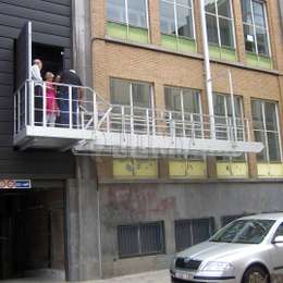 Counterbalanced stairs for school evacuation Counterbalanced stairs outside of a school for street-side evacuation